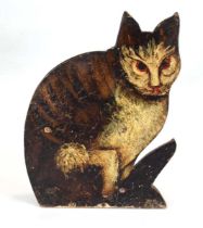 A vintage candle holder naively modelled as a seated cat, h. 32 cm