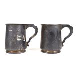 A pair of early 20th century silver tankards of typical form, WM Ltd., Birmingham 1935, h. 11.5