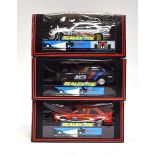 Three Scalextric slot cars:C571 BMW 318i Autosport No. 16,C464 BMW M3 andC409 BMW M3, all boxed (3)