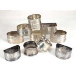 Ten silver napkin rings, various designs, dates and makers, overall 7.5 ozs (10)Personalised
