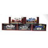 Five Scalextric slot cars:C144 Team Lancia,C384 Taurus Rover 3500,C280 PMG Rover,C631 Opel Calibra
