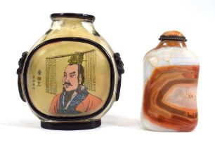 A Chinese Export snuff bottle internally decorated with a figure wearing a traditional headdress, h.