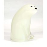 A Murano vaseline glass figure modelled as a seated polar bear, etched 'Murano' to base, h. 22.5