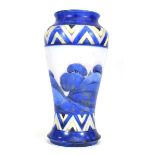 A 1920's William Moorcroft vase of inverse baluster form, decorated in the 'Dawn Landscape' pattern,