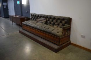For restoration: A substantial button upholstered and ebonised satin walnut snooker bench in the