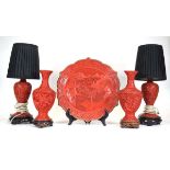 A pair of cinnabar style table lamps together with matching vases and charger (5)