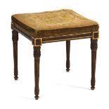 A Regency ebonised and gilded stool with an embroidered seat