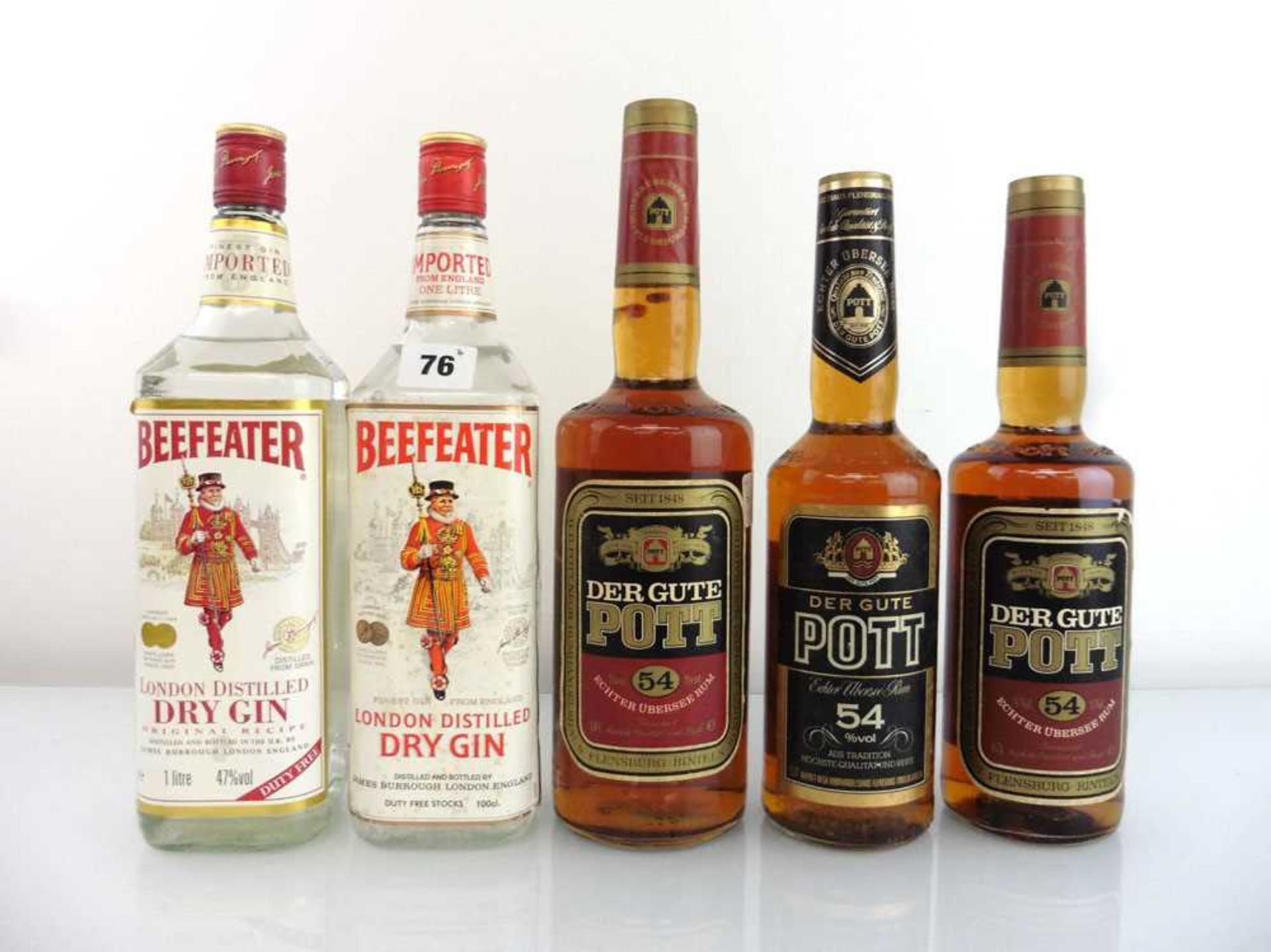 5 old bottles, 3x Der Gute Pott German dark "54" Rum 54% 2x 70cl & 1x 1 litre and 2x Beefeater