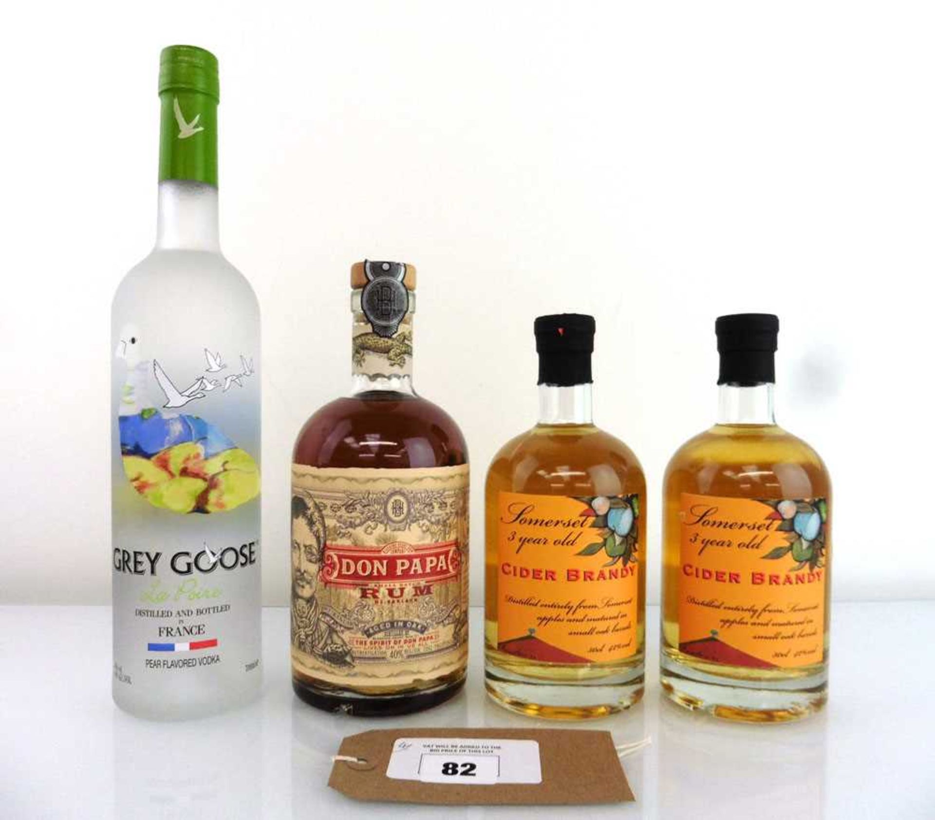 +VAT 4 bottles, 1x Grey Goose La Poire Vodka 40% 70cl, 1x Don Papa Small Batch Rum from