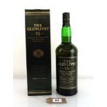 A bottle of The Glenlivet 15 year old Export Strength Original Pure Single Malt Scotch Whisky with