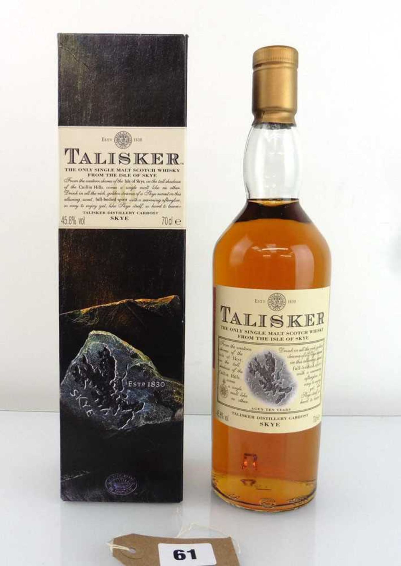 A bottle of Talisker 10 year old Single Malt Scotch Whisky from The Isle of Skye with box, old style