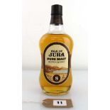 A bottle of Isle of Jura 8 year old Pure Malt Scotch Whisky, circa 1970's 26 2/3 fl oz 75.7cl 70