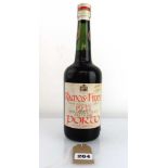 A bottle of 1937 Ramos Pinto Colheita Port Portugal (Ullage into neck)
