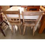 Four Provincial elm seated dining chairs