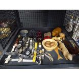 Cage containing wrist watches, paperweights, ornamental figures and treen