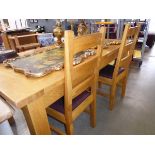 Oak extending dining table plus two chairs