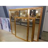 Four modern large gilt framed rectangular mirrors