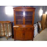 Glazed oak bookcase with cupboard base under