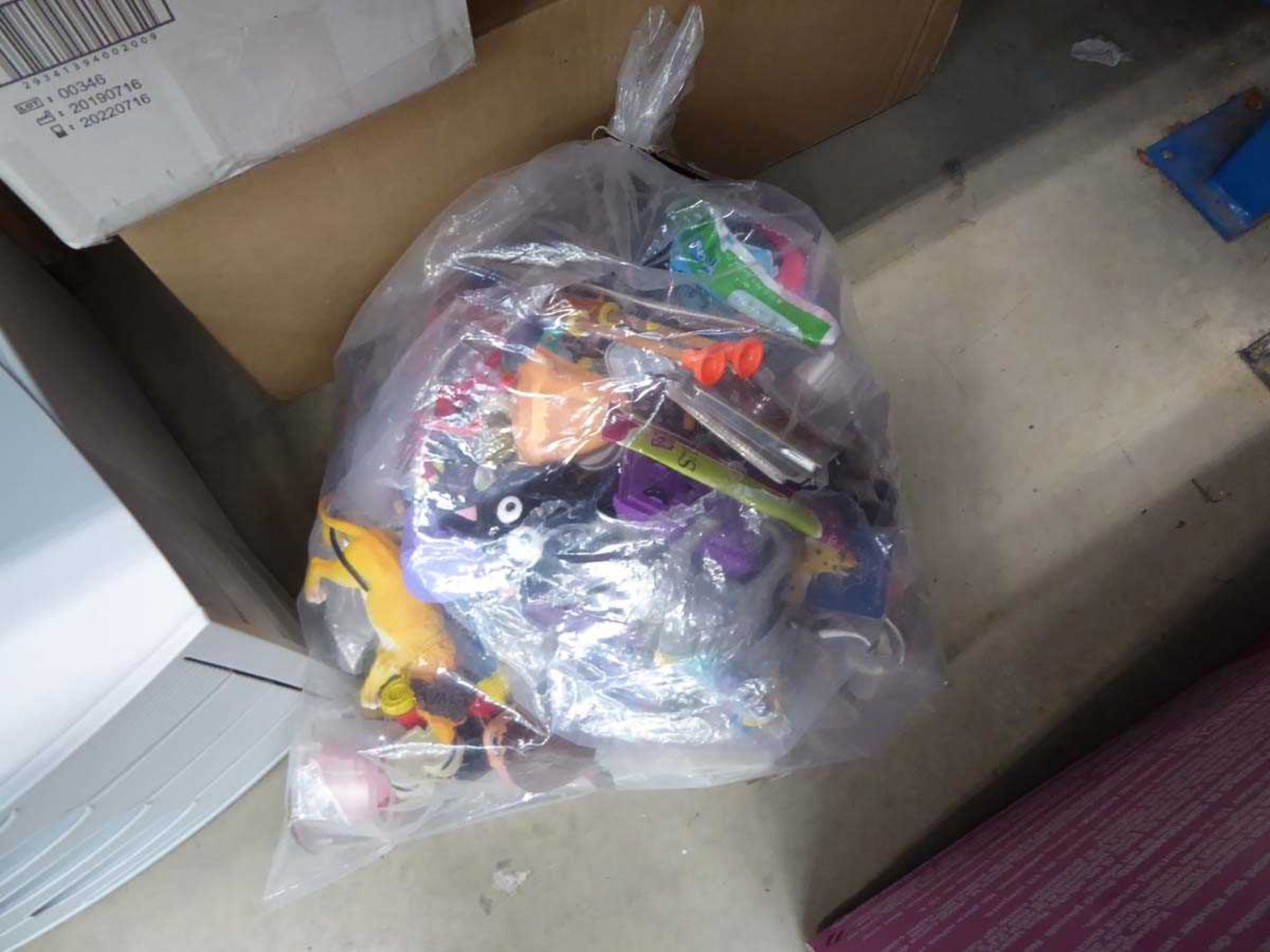 Bag of mixed figurines and loose toys