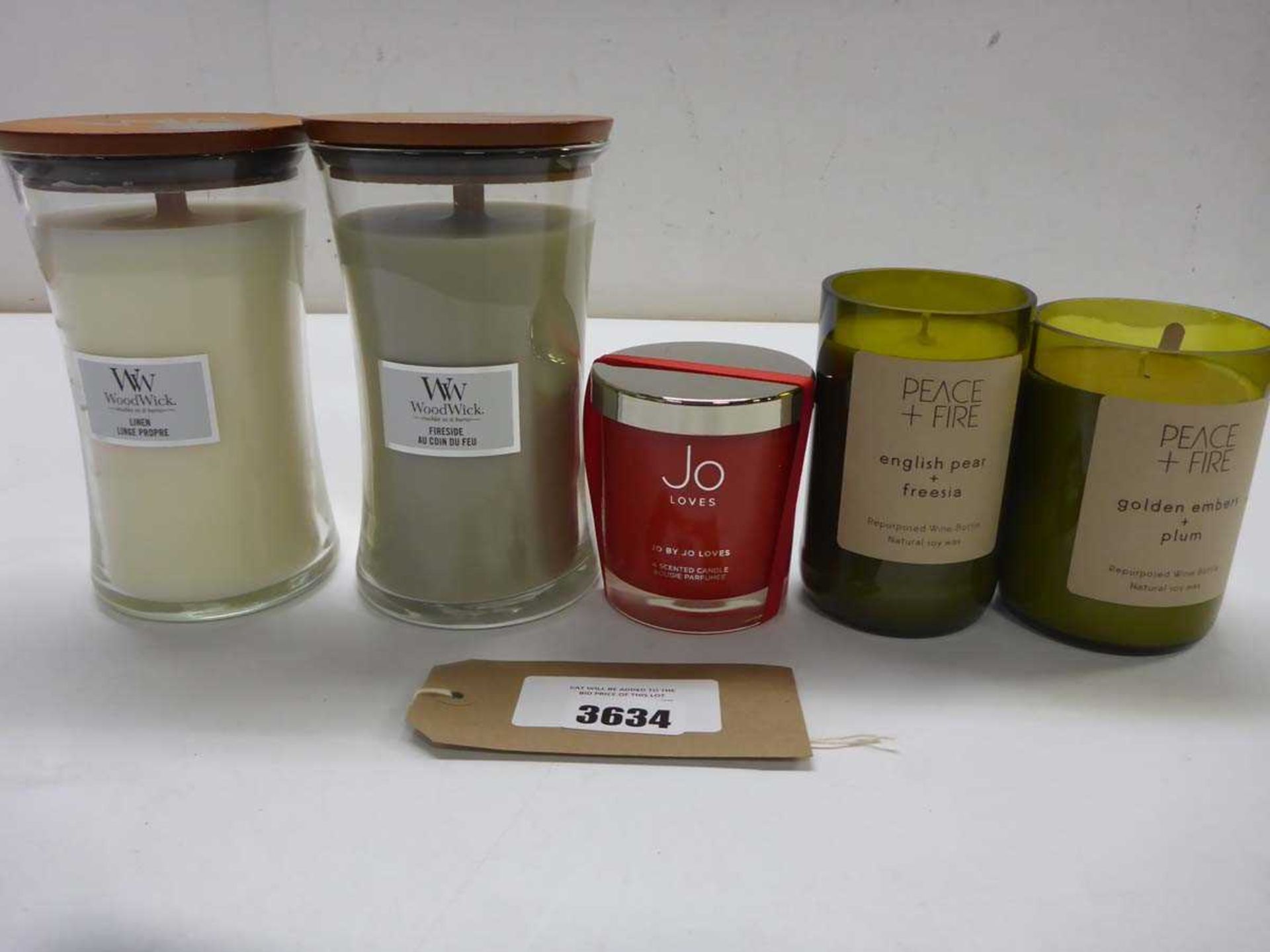 +VAT Selection of scented candles comprising Jo Loves, Peace & Fire & Wood Wick