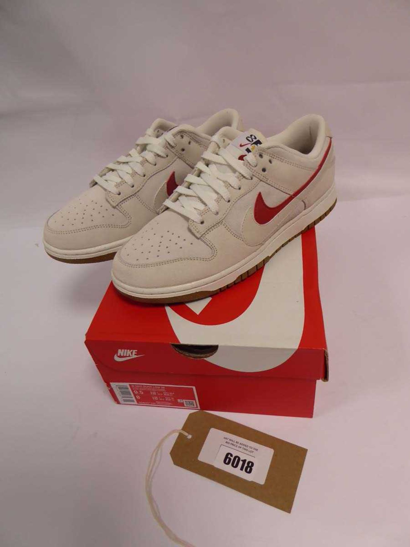 +VAT Boxed pair of women's Nike Dunk Low SE trainers in white, size 7