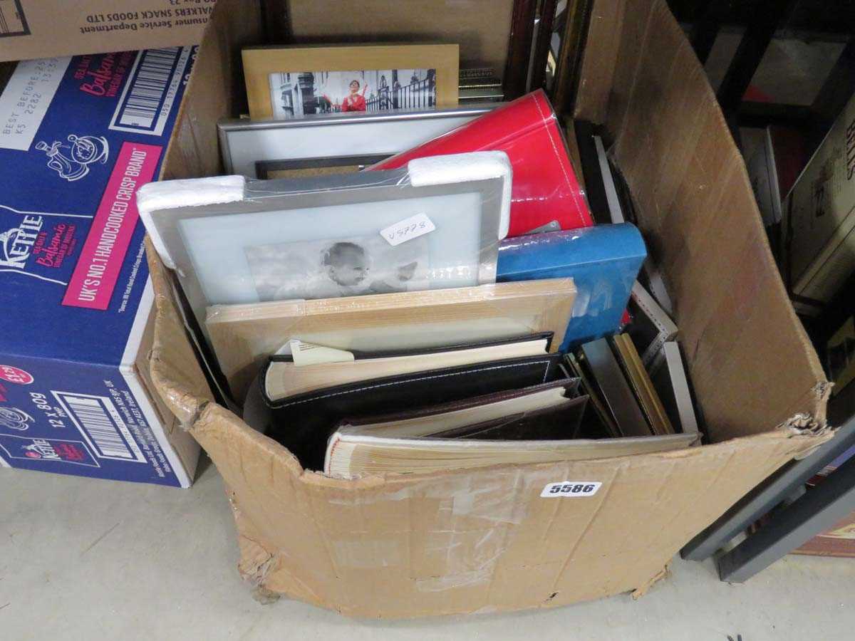 Box containing quantity of picture frames and empty stamp albums