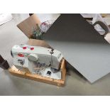 Cased electric sewing machine