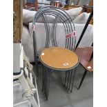 Four metal and plywood chairs