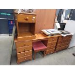 Three piece bedroom suite comprising dressing table, bedside cabinet and chest of four drawers