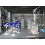 Cage containing decanters, glass vases and a Bohemian decanter with six matching wine glasses