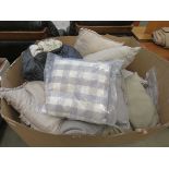 Box containing a quantity of cushions