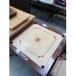 Gaming table on folding metal base