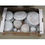 Box containing floral patterned Denby crockery