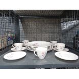 Cage containing a quantity of Royal Doulton pillar rose patterned crockery