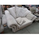 Oatmeal fabric two seater sofa with scatter cushions