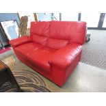 Pair of red leather effect 2 seater sofas