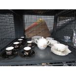 Cage containing export Japanese crockery