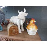 Large figure of bull, Victorian foot warmer, egg basket and recipe book stand