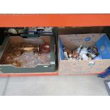 2 boxes containing decanters, lemonade jug and tumblers plus bells and ornamental figures