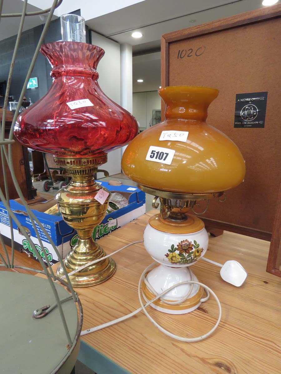 Two pottery and brass table lamps with glass shades