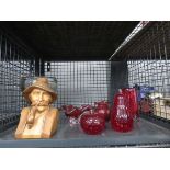 Cage containing a carved figure plus coloured glass vases and dishes