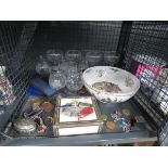 Cage containing wine glasses, Babycham glasses, patterned bowl, lighter, coins and ornaments