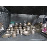 Cage containing a collection of pewter mugs