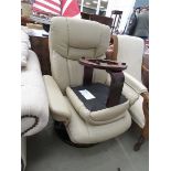 Beige leather effect swivel armchair with matching footstool