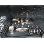 Cage containing silver plate to include candlesticks, toast racks, egg cups, butter dish and trays