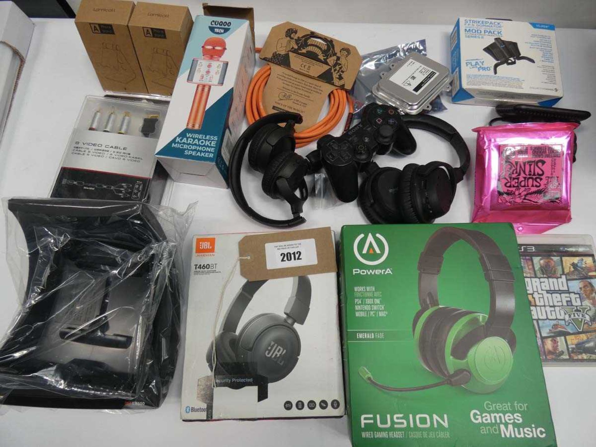 +VAT Mixed lot containing headphones/headsets, microphone, laptop stand, audio cable, etc