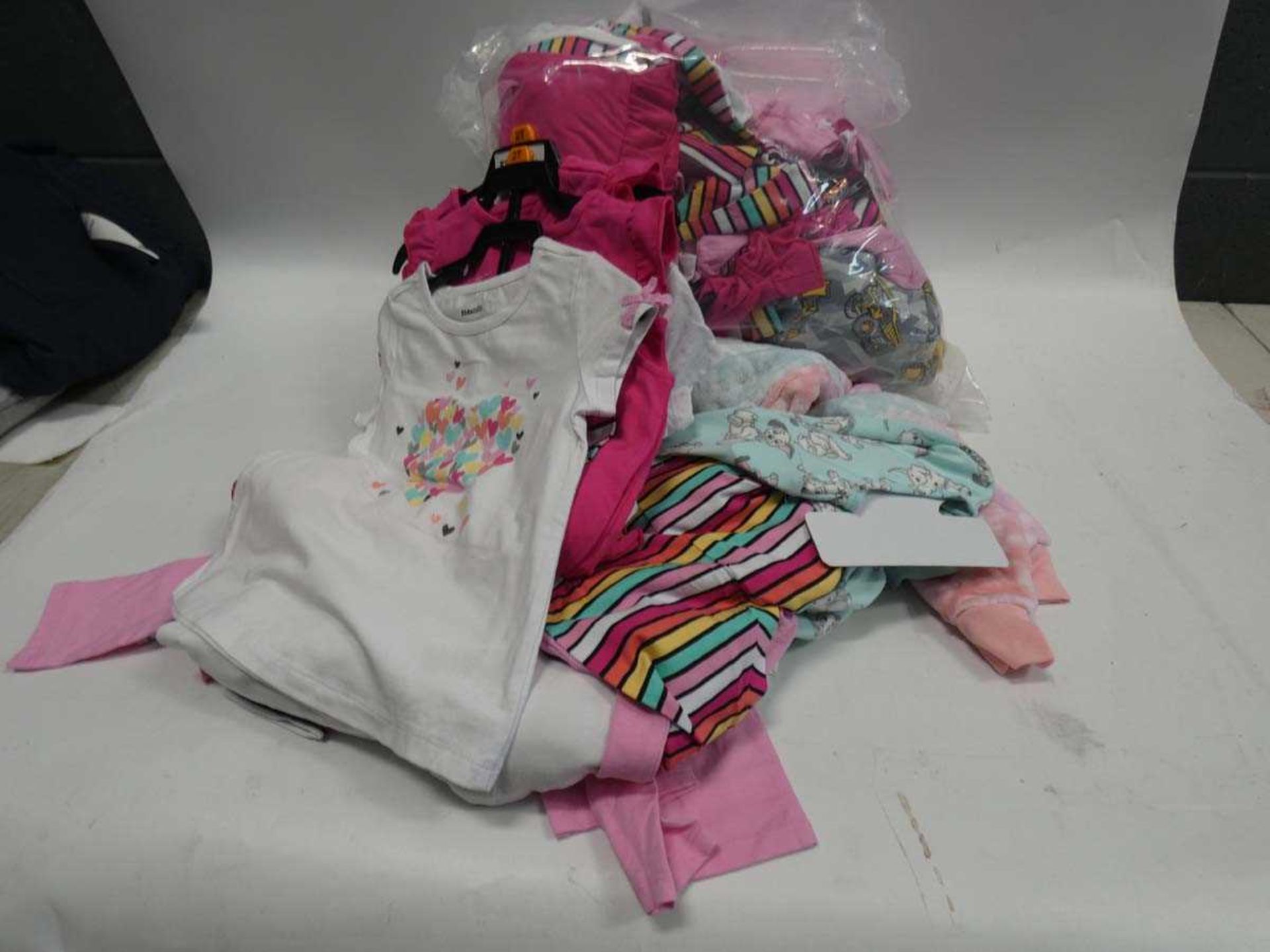 Bag of childrens clothing to include sleepwear, tshirt sets, etc