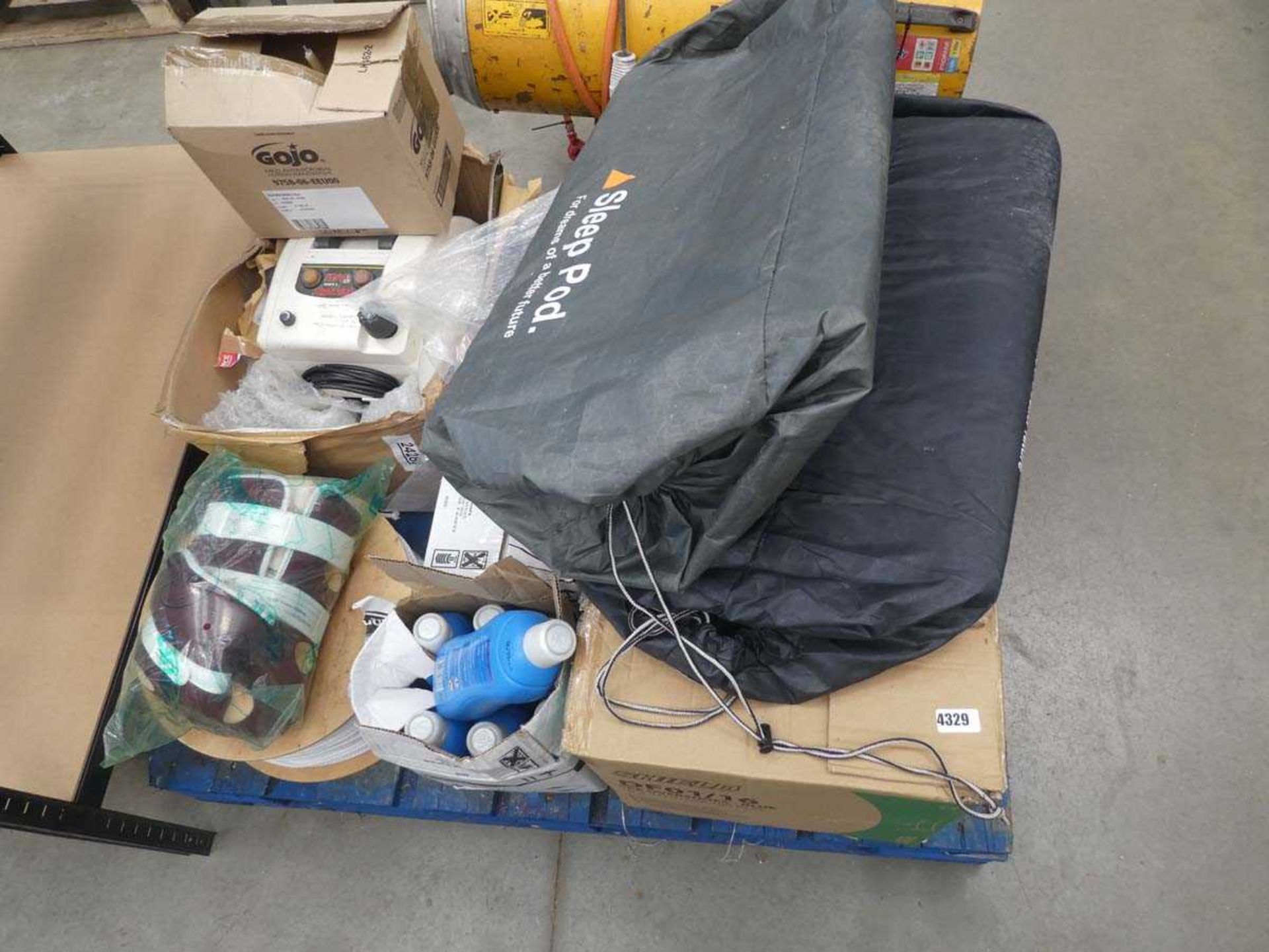 Pallet containing sleep pod, sterilising fluid, rope and various other items