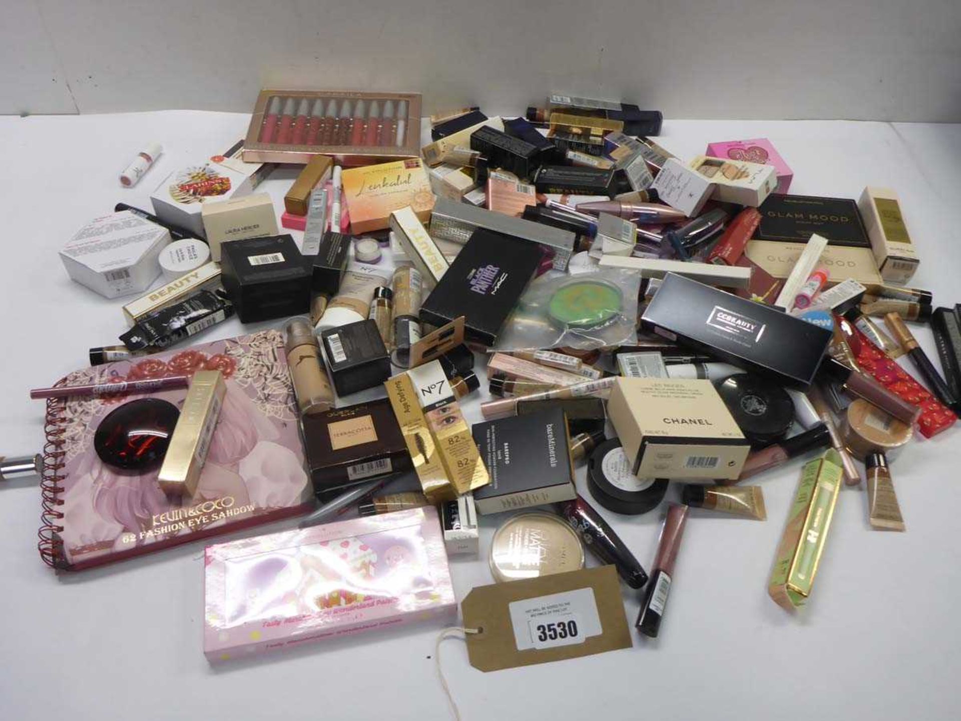 +VAT Large quantity of assorted cosmetics including Chanel, bareMinerals, Revolution, Guerlain,