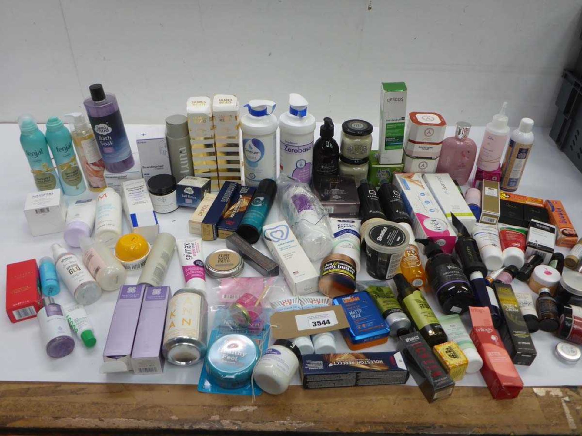 +VAT Large bag of toiletries including self tan, shower mousse, moisturizing creams, hair products